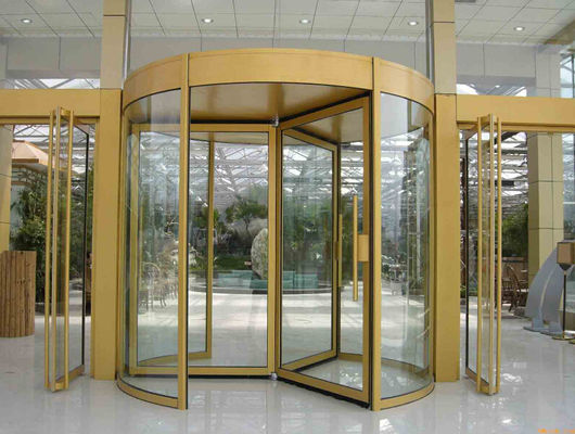 Chiny Security glass 2 wing golden automatic revolving door Of aluminium frame fabryka